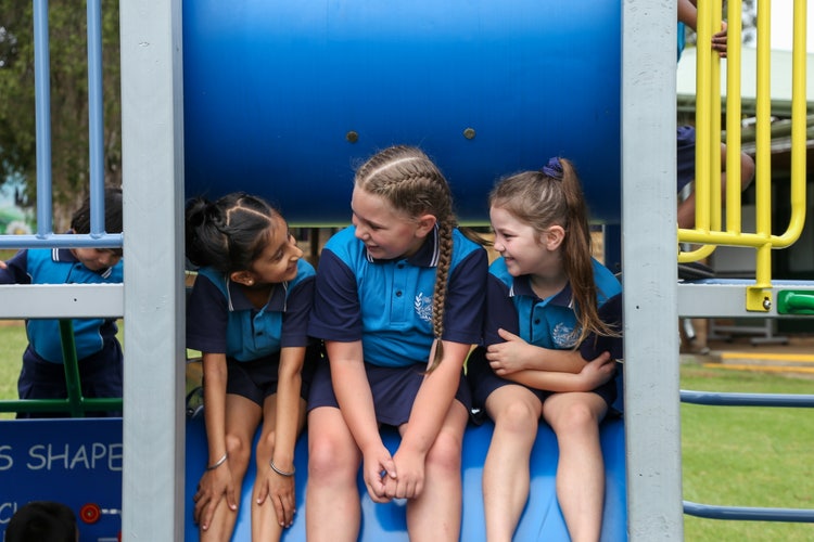 Students on playground equipment